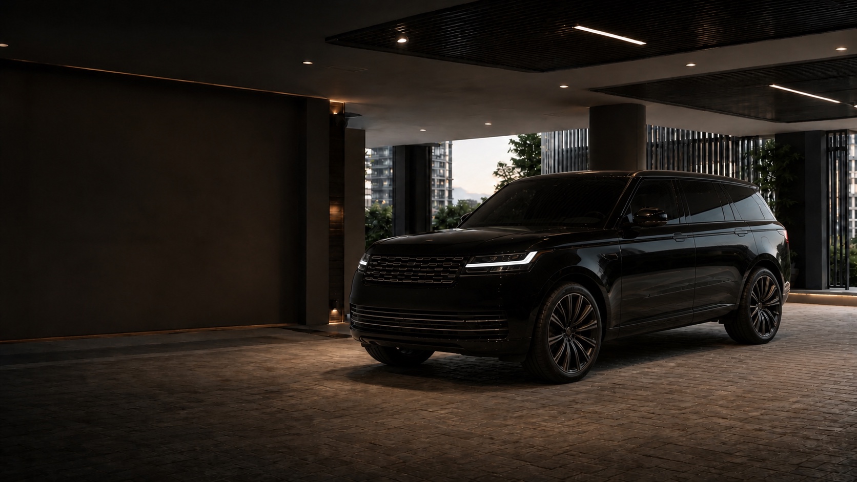 Unbranded black flagship luxury SUV in a private arrival bay